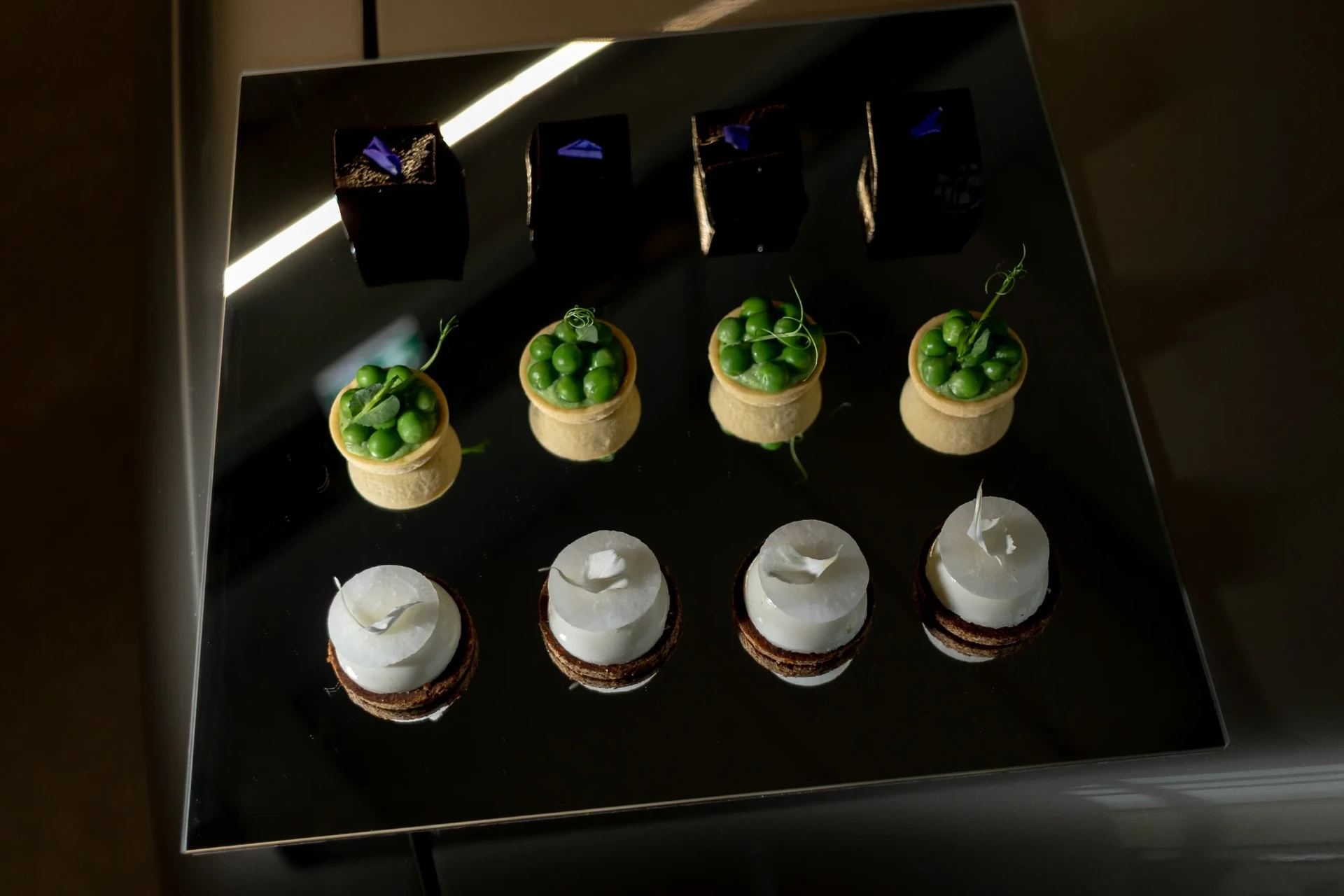 Small dishes in bowls on a tray