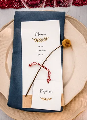 Wedding invitation and stationery on a table
