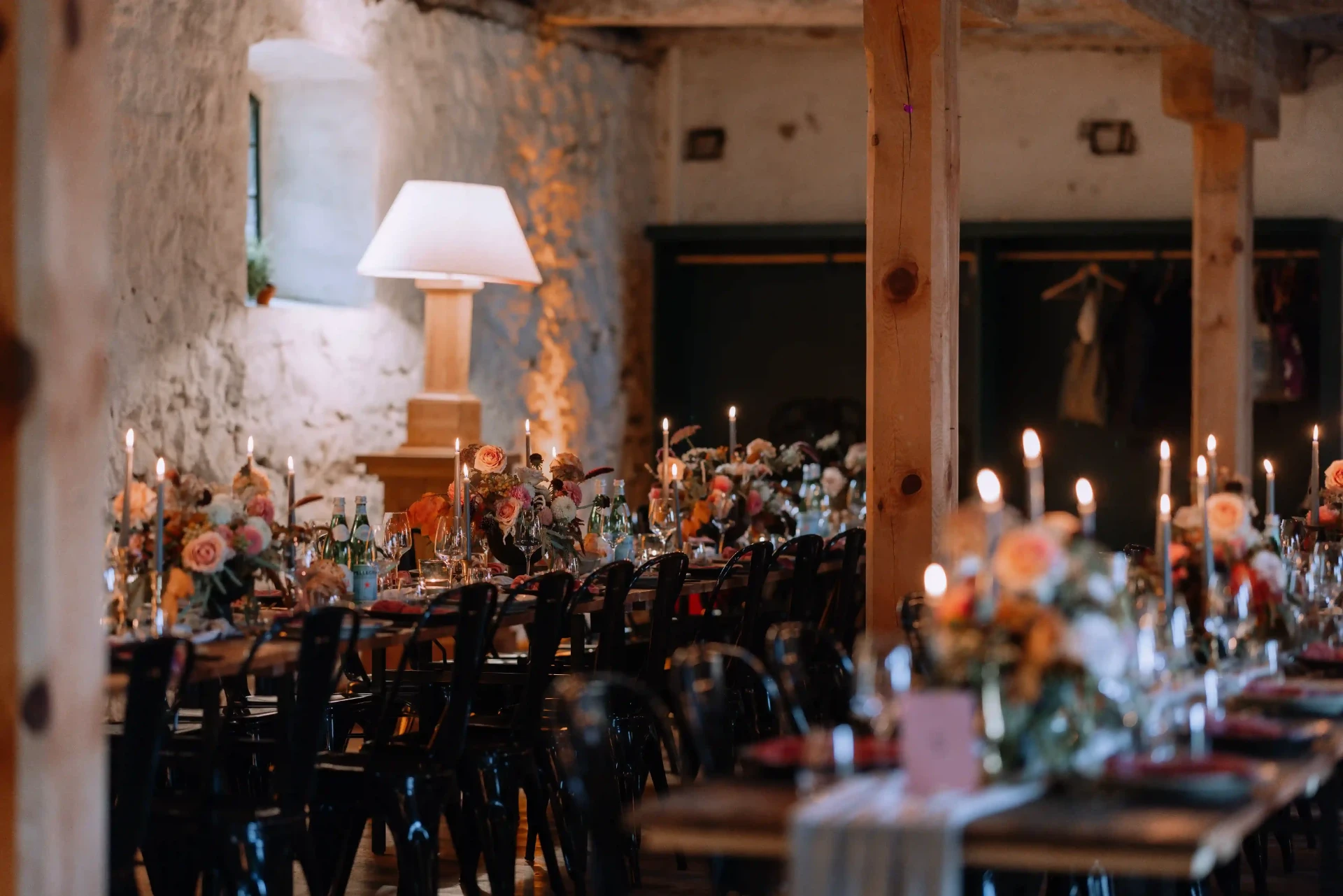 Wedding guests welcoming the bride and groom outdoors