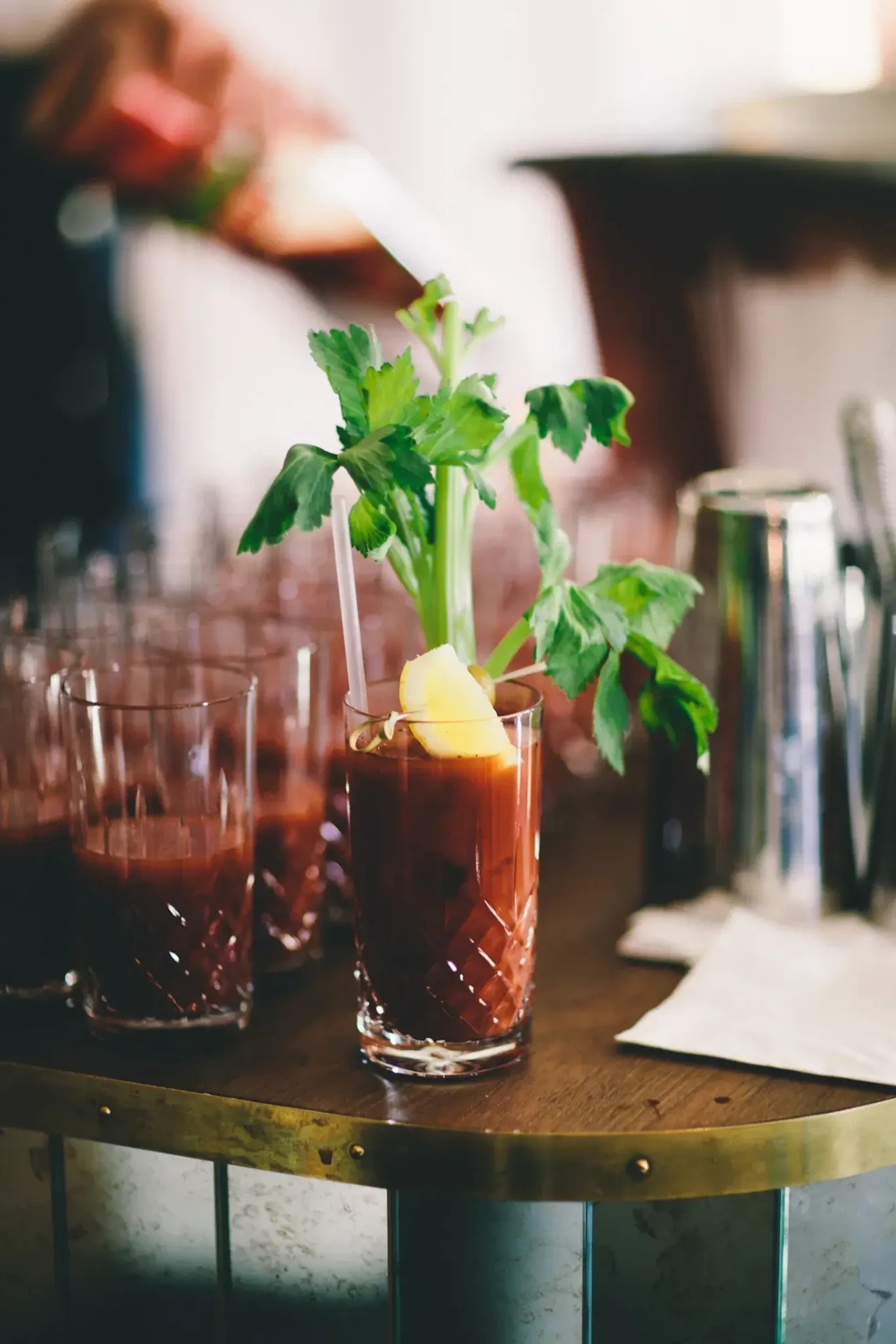 Bartender preparing drinks behind a bar
