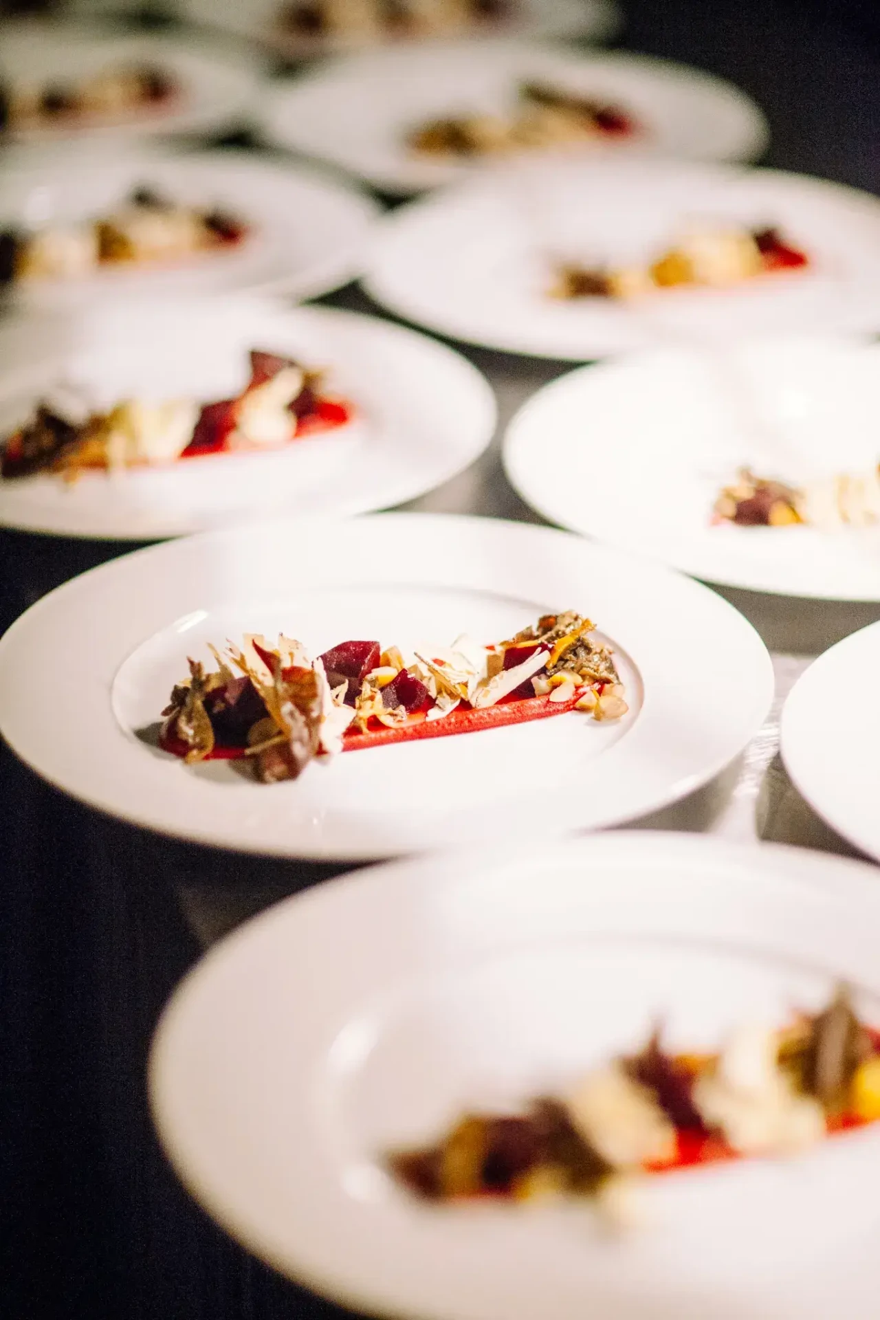 Small dishes served on white plates