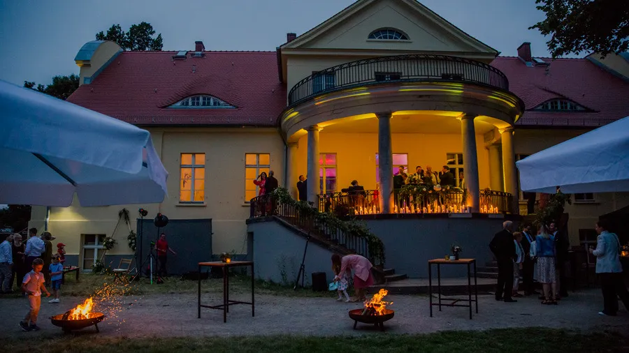 Villa with illuminated windows at dusk