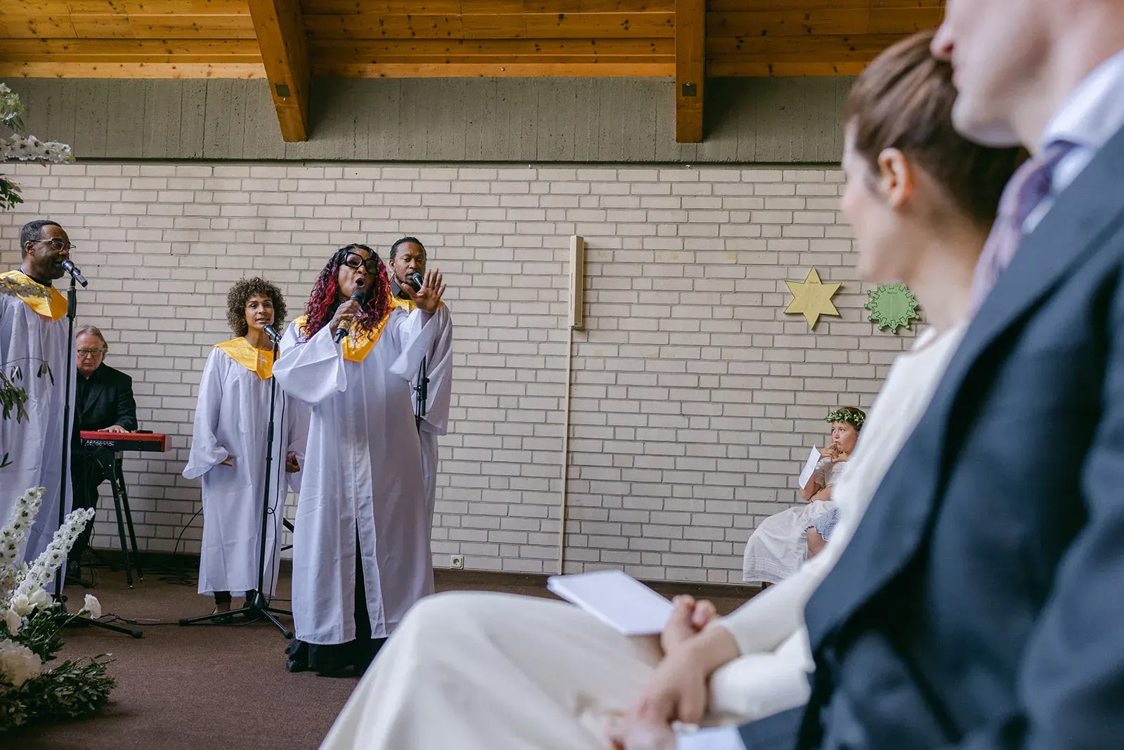 Clergyman and wedding couple during a church ceremony