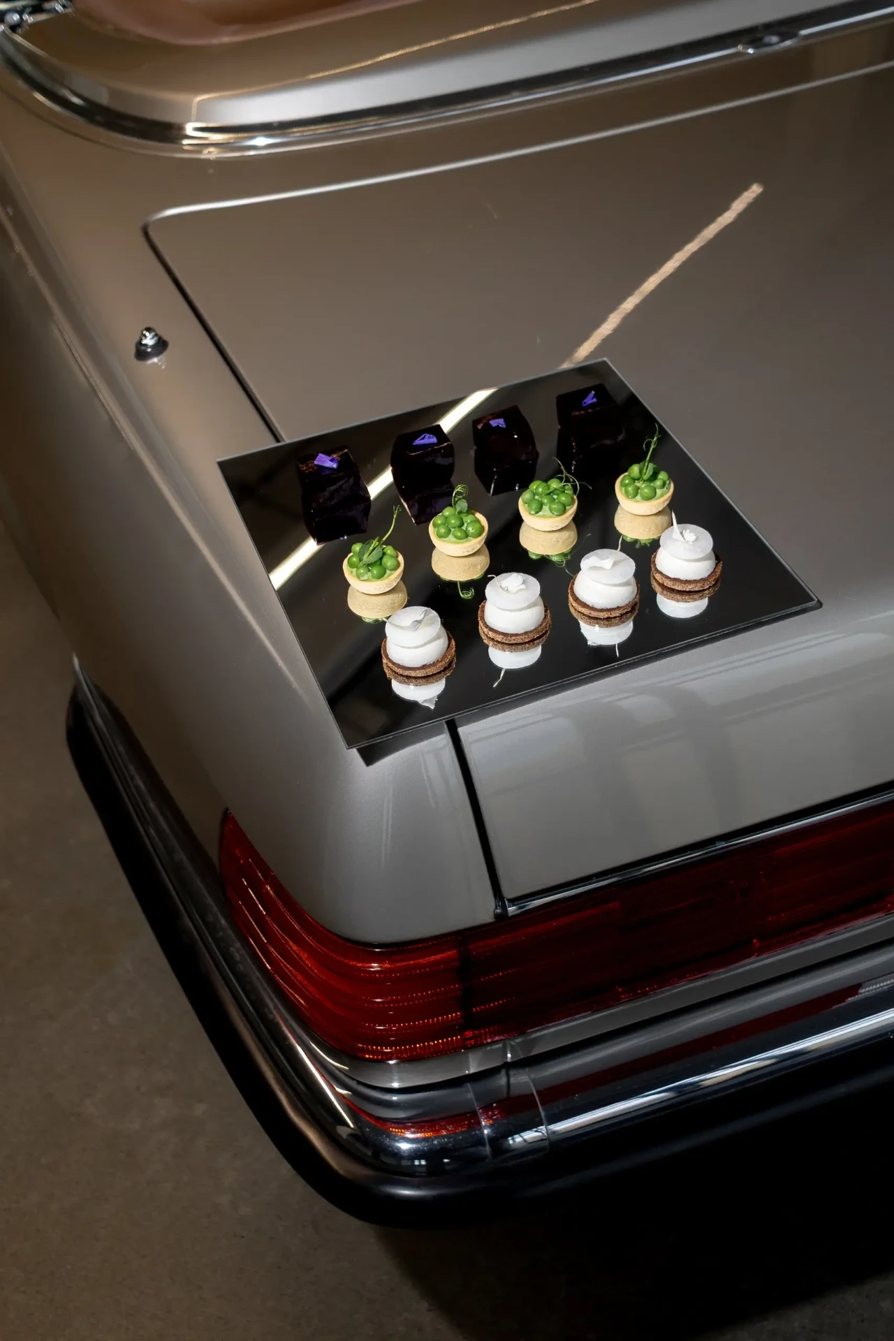 Champagne bottle in a car trunk