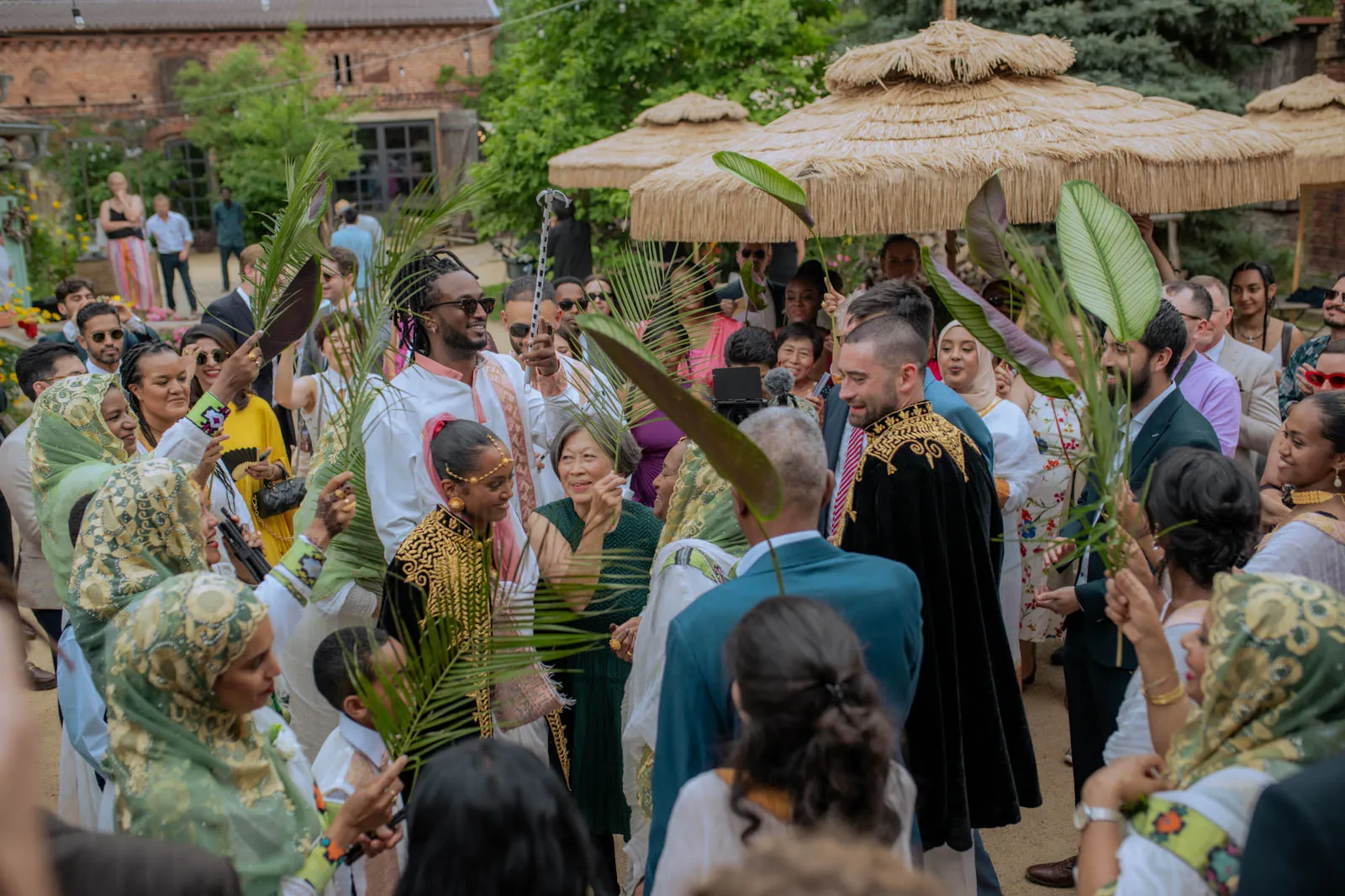 Wedding guests celebrating together during a culturally inspired wedding ceremony