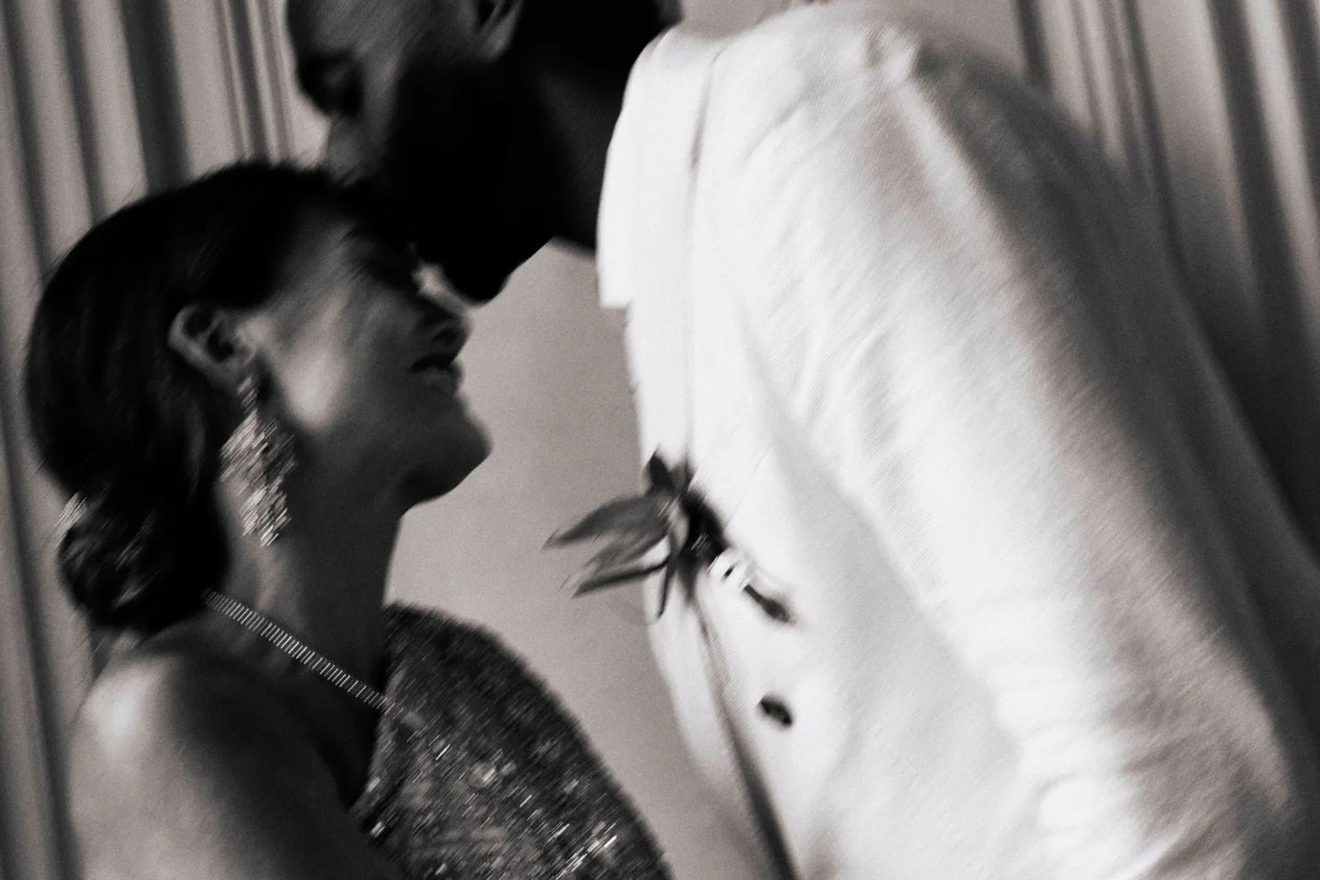 Bride and groom in an expressive black-and-white wedding portrait