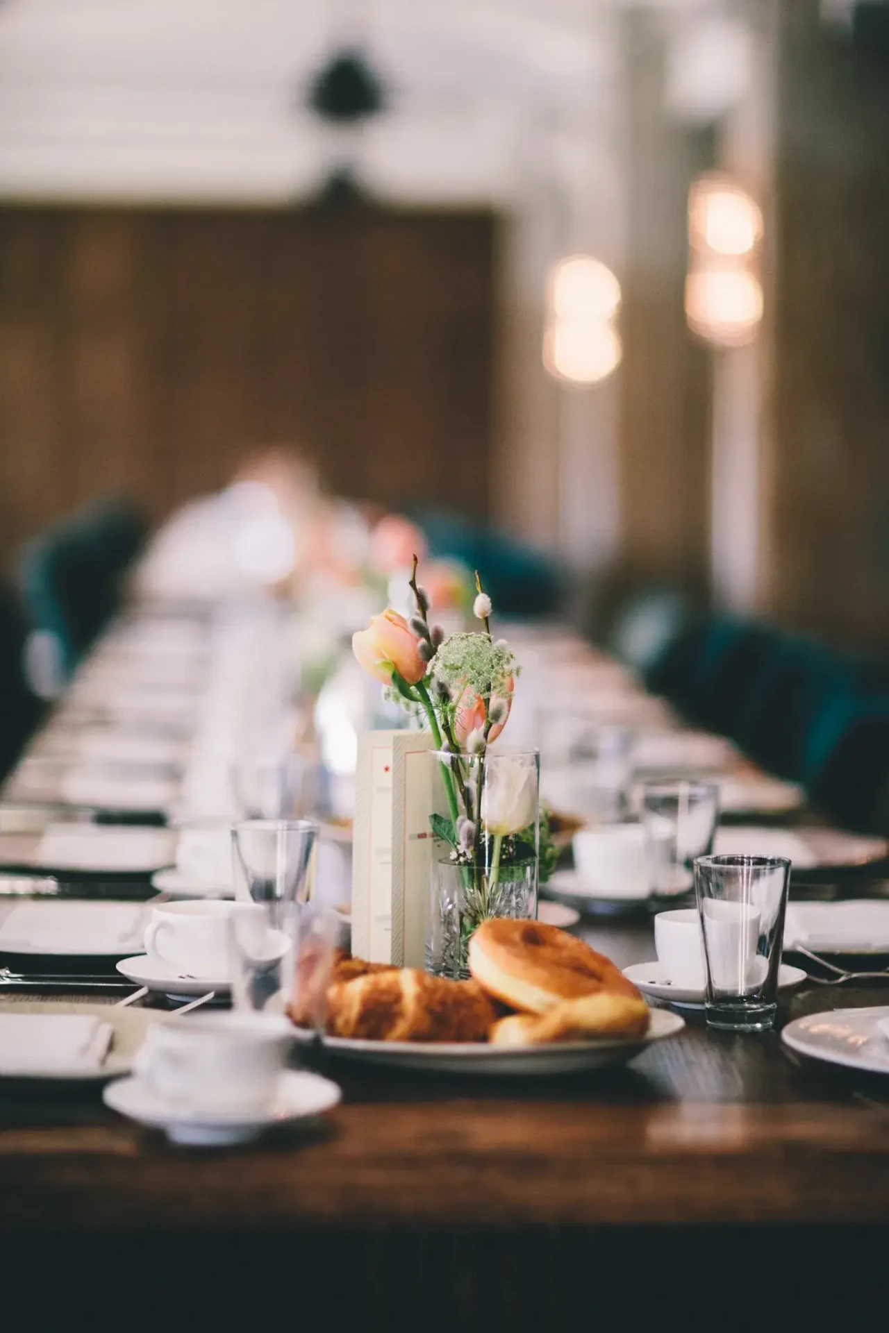 Plates of food on a festively set table
