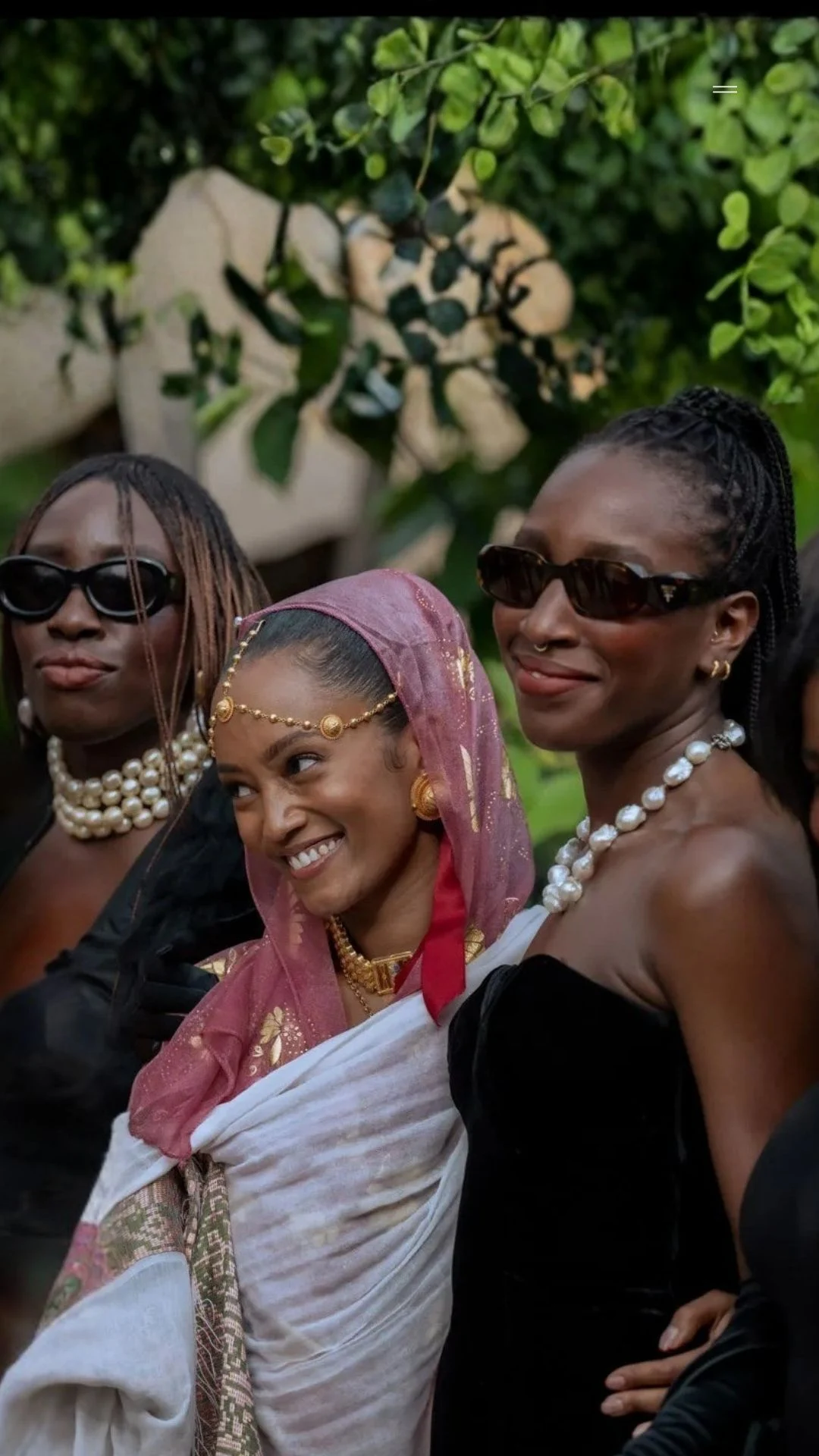 Wedding guests wearing distinctive outfits and statement jewellery