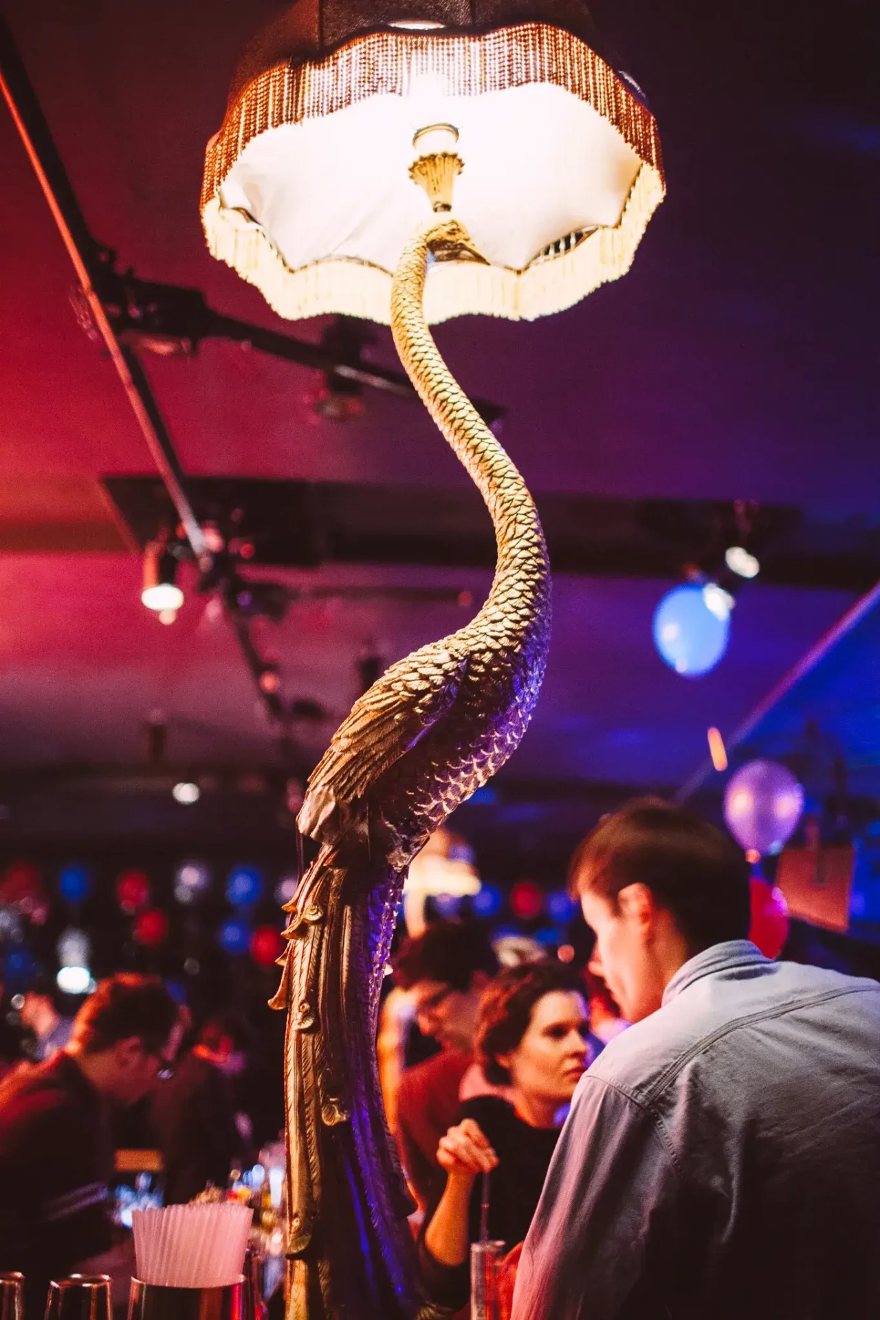 Illuminated decoration with a figure and colourful lighting
