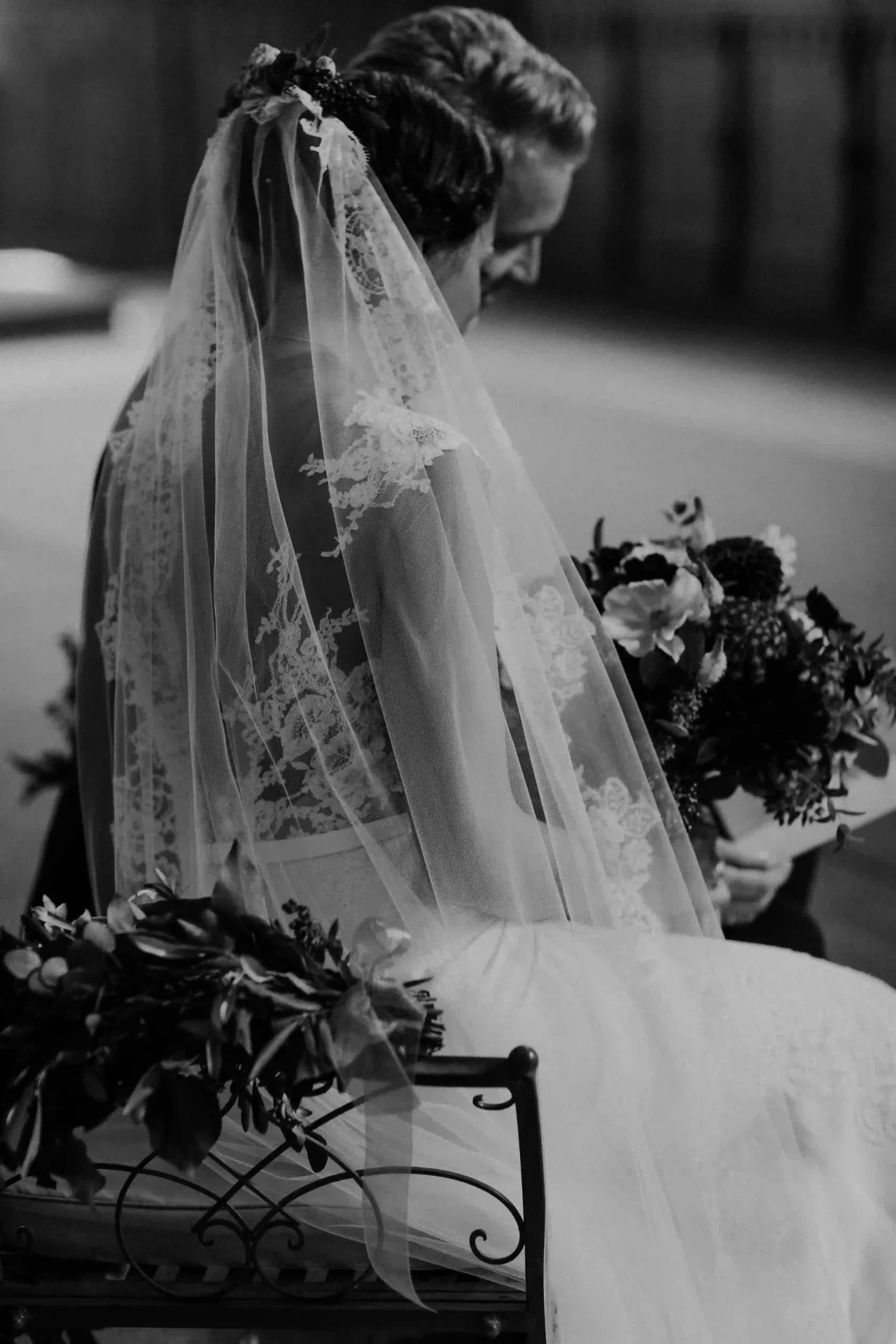 Bride wearing a veil during the ceremony