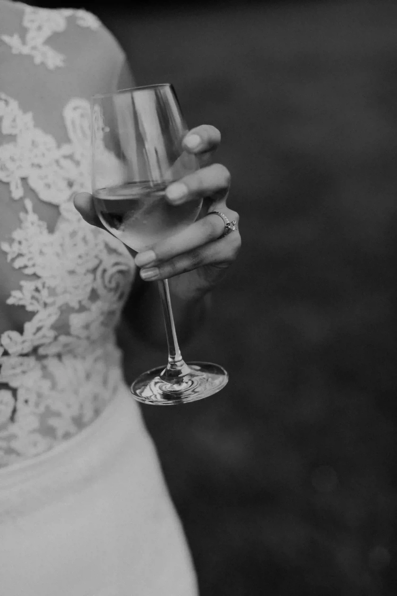 Close-up of a champagne glass held in a hand