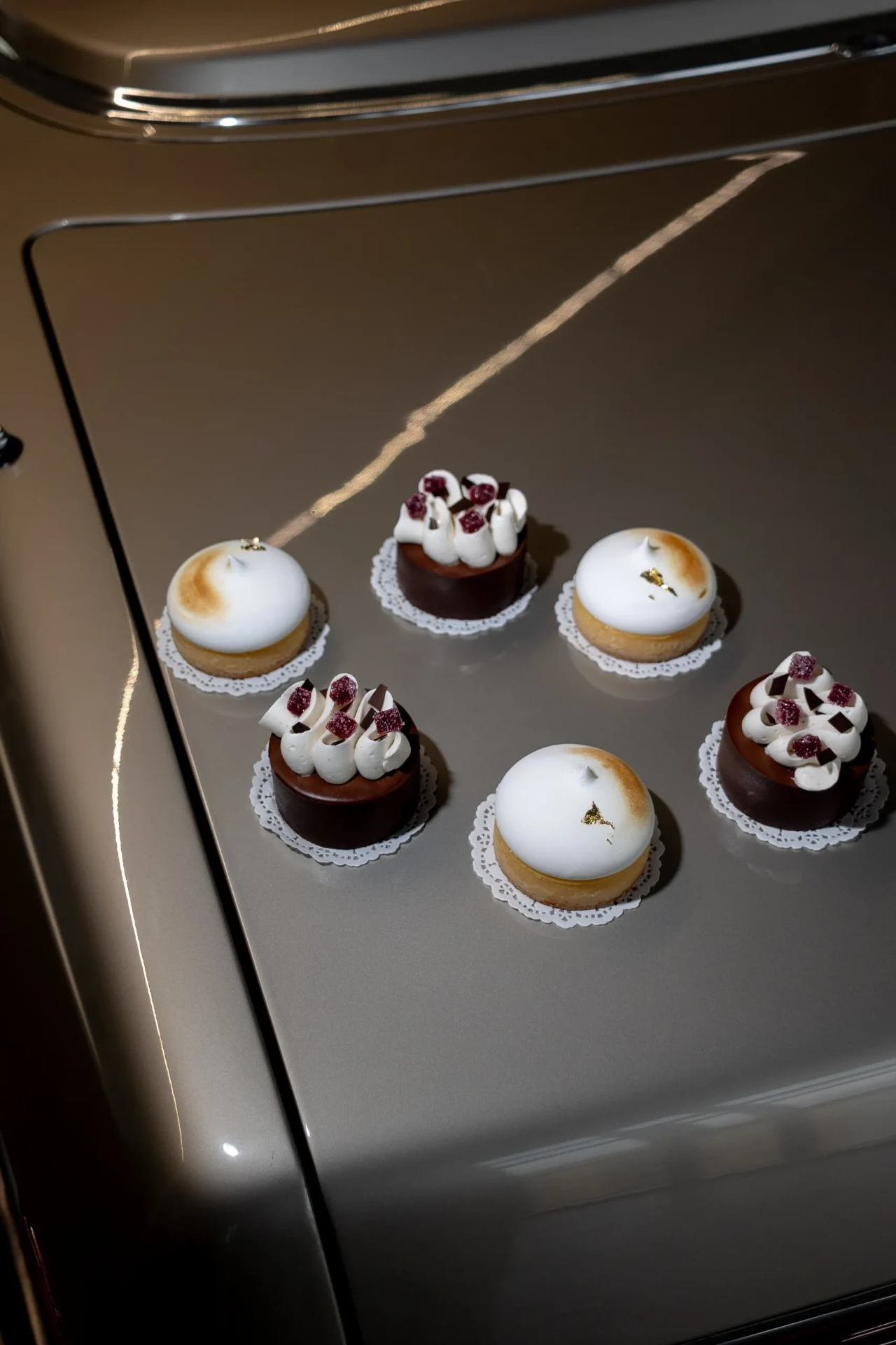 Small desserts arranged on a tray
