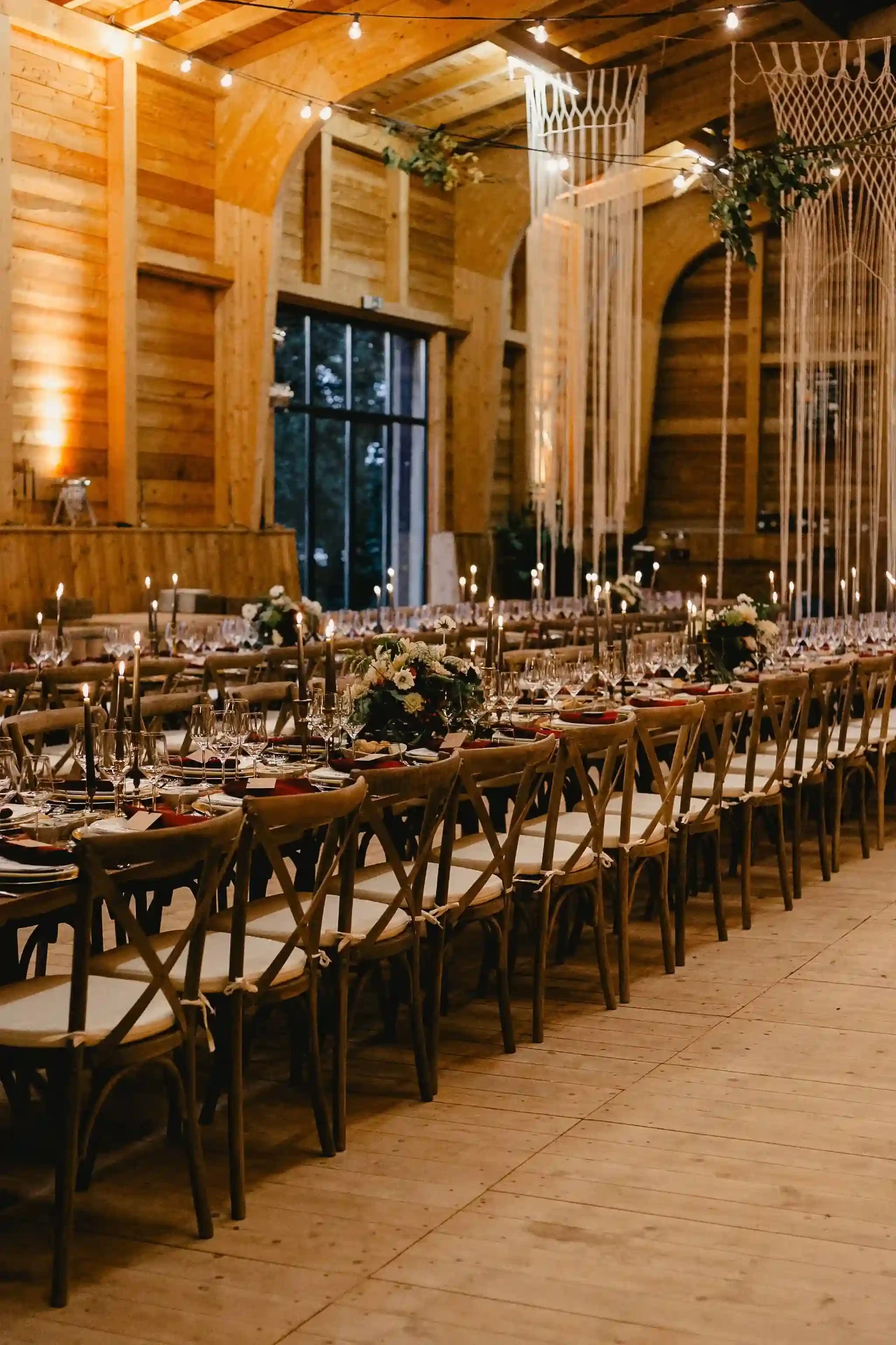 Long wedding table in a warmly lit interior