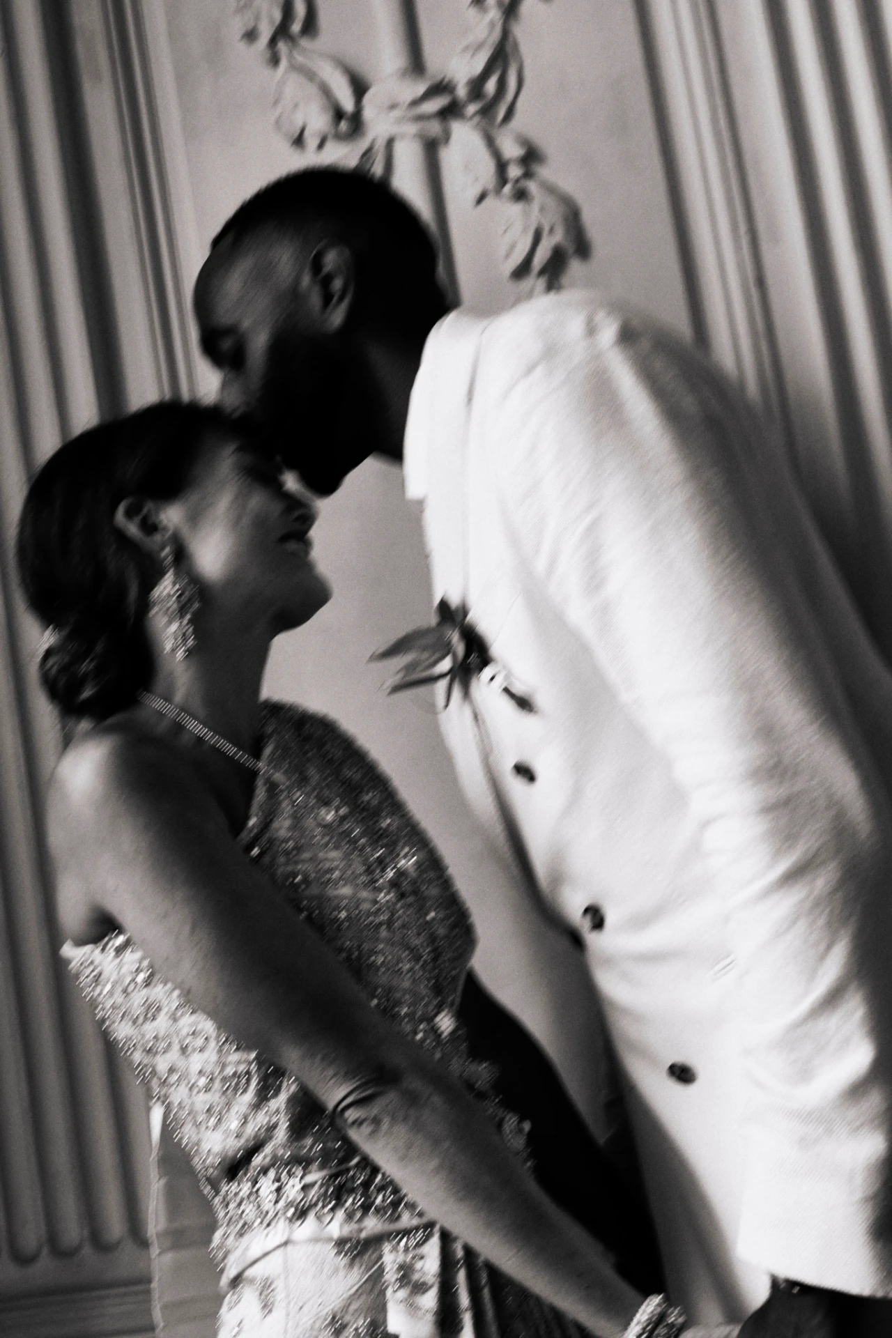 Bride and groom in an expressive black-and-white wedding portrait