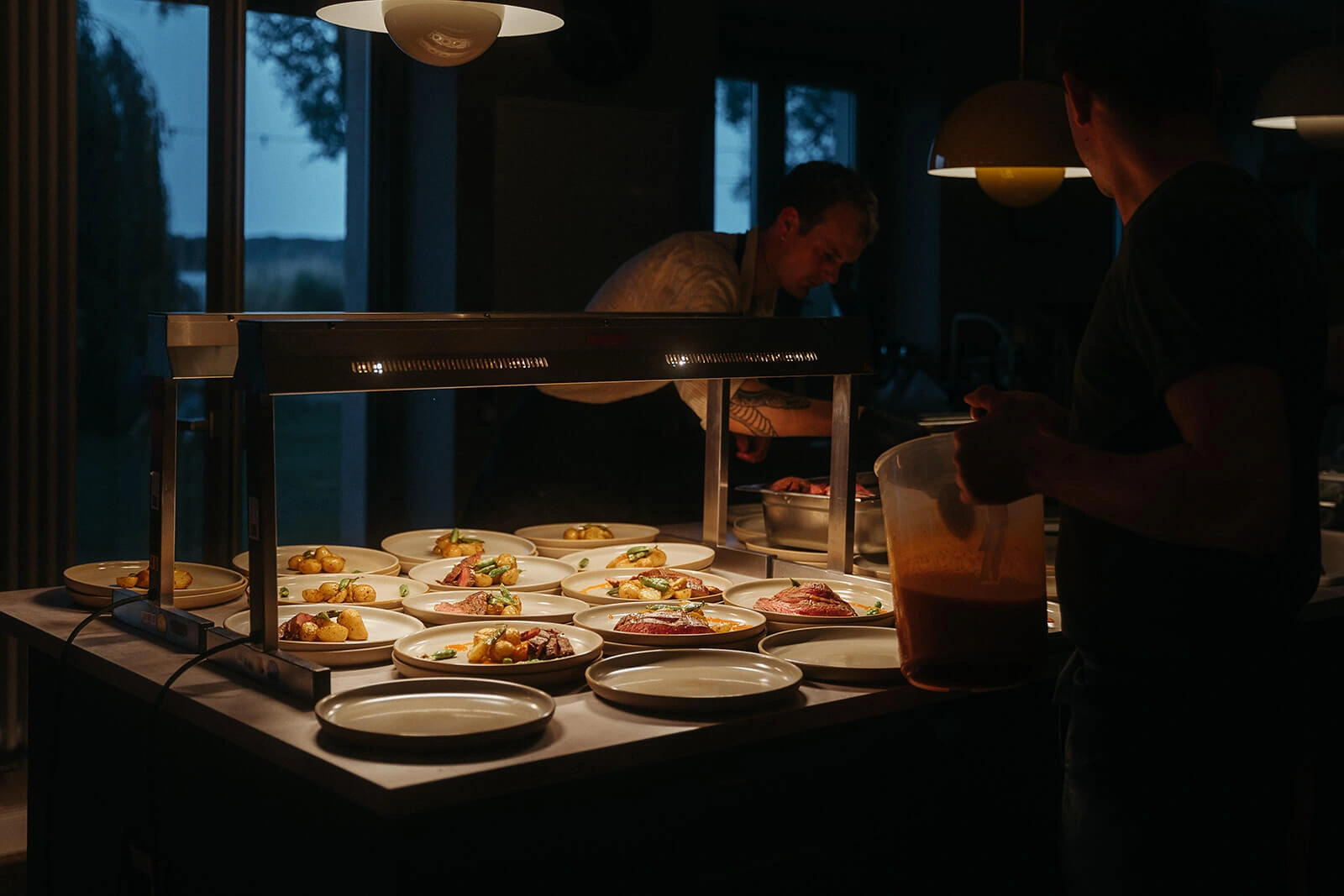 Festively set table in a dark room