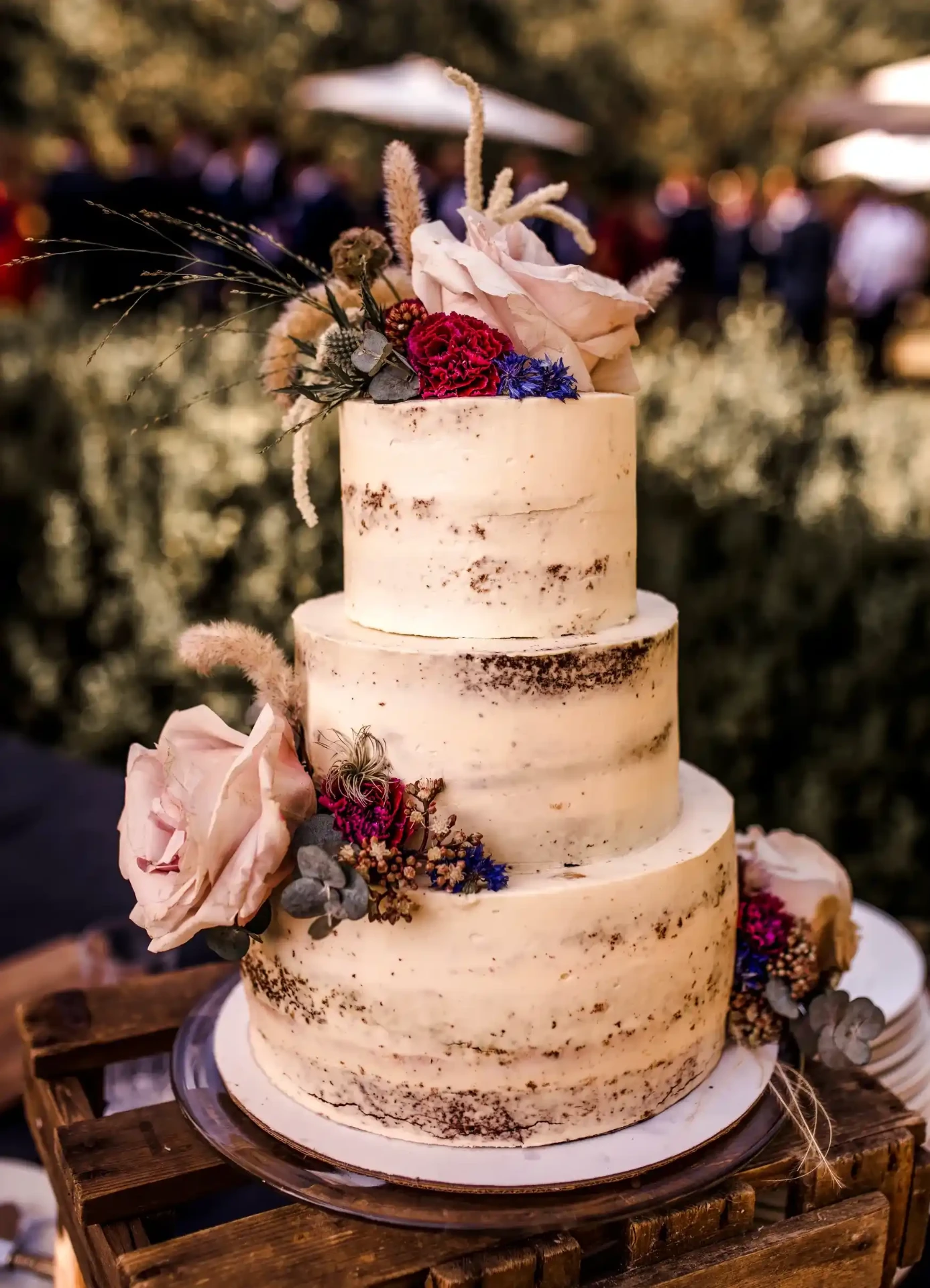 Wedding cake with simple decoration outdoors